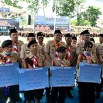 Gubernur Sumatera Utara (Sumut) Muhammad Bobby Afif Nasution di dampingi Penjabat Sekretaris Daerah Provinsi (Sekdaprov) Sumut Sulaiman Harahap beserta Seluruh OPD dan Forkopimda, menutup secara resmi Jambore Daerah XI di lapangan bumi perkemahan Sibolangit, Kabupaten Deliserdang, Minggu (12/7/2026). Foto/Diskominfo Sumut